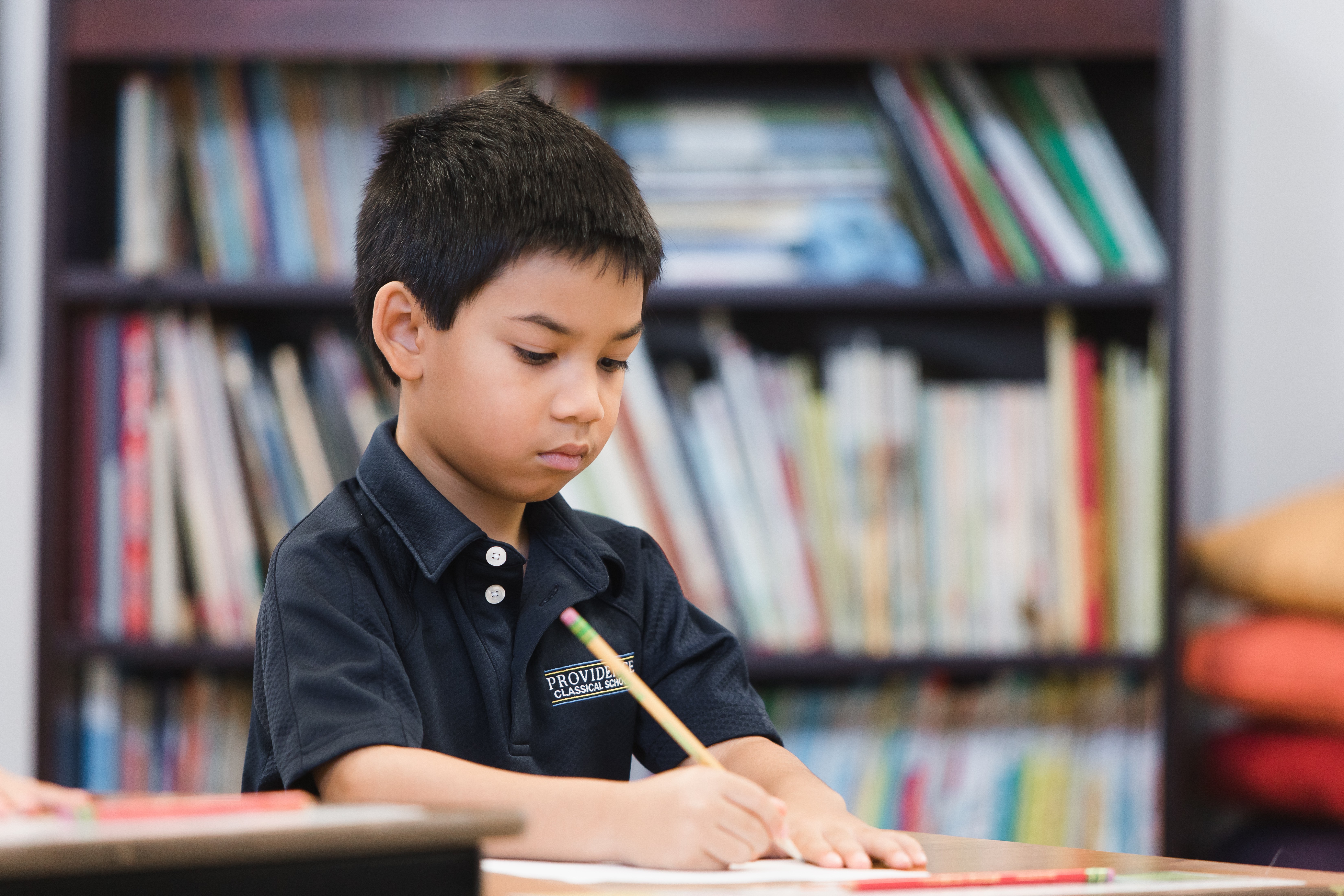 Child taking test at Providence Classical School