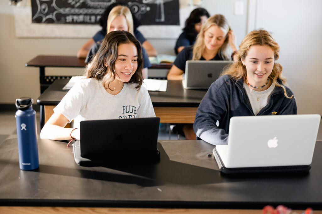 Providence Classical School students using laptop computers