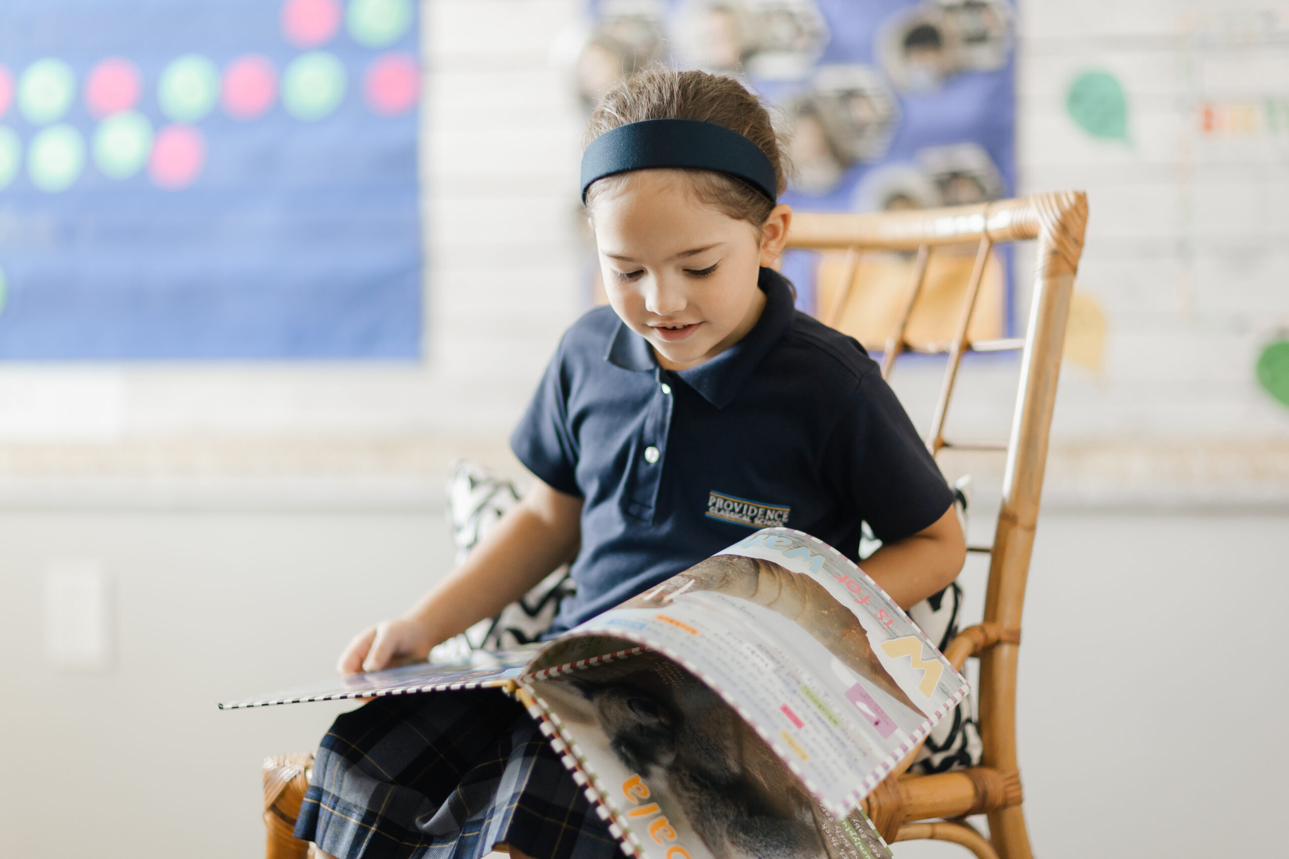 Young girl reading book